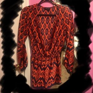 Low v-cut long sleeve romper